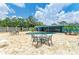 Beautiful backyard pool area with updated patio and furniture, perfect for outdoor entertaining at 2726 Desoto Rd, Sarasota, FL 34234