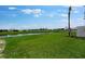 A lush backyard and pond offer serene views at 3204 Torta Ct, Bradenton, FL 34211