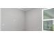 Bedroom features neutral paint, and natural light from the window at 3204 Torta Ct, Bradenton, FL 34211