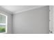 Bedroom with neutral paint and bright window at 3204 Torta Ct, Bradenton, FL 34211