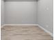 This bedroom features durable wood-look floors and neutral walls at 3204 Torta Ct, Bradenton, FL 34211