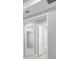Hallway with doorways to multiple rooms at 3204 Torta Ct, Bradenton, FL 34211