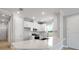 Bright, all-white kitchen featuring stainless steel appliances and lots of storage space at 3204 Torta Ct, Bradenton, FL 34211
