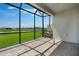 Enjoy peaceful water views from this screened-in lanai with brick flooring at 3204 Torta Ct, Bradenton, FL 34211