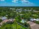 Community aerial view features pools and lush landscaping creating a relaxing neighborhood ambiance at 326 25Th W St, Bradenton, FL 34205