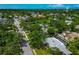 Aerial perspective of a residential neighborhood with verdant landscaping and serene streets at 326 25Th W St, Bradenton, FL 34205