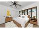 This inviting bedroom offers natural lighting, modern furniture, and stylish décor for a peaceful retreat at 326 25Th W St, Bradenton, FL 34205