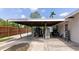 View of a carport featuring weights and other exercise equipment at 326 25Th W St, Bradenton, FL 34205