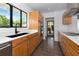 Bright kitchen with stainless steel appliances, modern tile flooring, and natural light to accentuate the space at 326 25Th W St, Bradenton, FL 34205