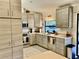 Updated kitchen featuring modern cabinetry, stainless steel appliances, and bright countertops at 3407 Avenida Madera # A, Bradenton, FL 34210