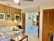 Living room with an open doorway that leads to a kitchen and dining area at 3407 Avenida Madera # A, Bradenton, FL 34210
