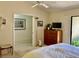 Cozy bedroom featuring a large window, comfortable bed, and ample closet space at 3407 Avenida Madera # A, Bradenton, FL 34210