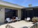 Charming outdoor patio with stylish chairs and a view of the serene surroundings at 3407 Avenida Madera # A, Bradenton, FL 34210