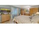 Bright bedroom with a cozy queen-size bed, lots of storage and sunny window views at 387 Eden Dr Dr, Englewood, FL 34223