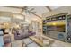 Spacious open concept living area with comfortable furnishings and views to the kitchen at 387 Eden Dr Dr, Englewood, FL 34223