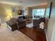 Cozy living room with comfortable seating, warm lighting, and an inviting atmosphere for relaxation at 387 Eden Dr Dr, Englewood, FL 34223