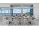 Dining area with seating for ten and stunning panoramic views of the water at 4035 Bay Shore Rd, Sarasota, FL 34234