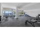 Bright exercise room with wall-to-wall windows, mirrors, and water views at 4035 Bay Shore Rd, Sarasota, FL 34234