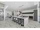 Spacious kitchen and dining area with marble floors, modern fixtures, and stainless appliances at 4035 Bay Shore Rd, Sarasota, FL 34234