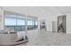 Bright open living room with waterfront views, and modern decor at 4035 Bay Shore Rd, Sarasota, FL 34234