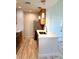 Kitchen area with stainless steel appliances and a view to the living room at 4037 Crockers Lake Blvd # 24, Sarasota, FL 34238