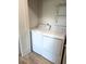 Laundry room with a white washer and dryer at 4037 Crockers Lake Blvd # 24, Sarasota, FL 34238