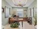 Well-lit home office featuring a tray ceiling, decorative accents, and neutral tones at 4121 Reflections Pkwy, Sarasota, FL 34233