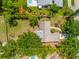 Overhead shot showcasing the property, landscaped yard, and proximity to nearby homes at 4253 Prairie View Dr, Sarasota, FL 34232