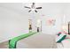 Spacious bedroom with a ceiling fan and access to an ensuite bathroom at 4253 Prairie View Dr, Sarasota, FL 34232