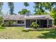 Back exterior of a home featuring a screen patio at 4253 Prairie View Dr, Sarasota, FL 34232