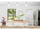 Modern kitchen with a butcher block island, stainless steel appliances, and updated fixtures at 4253 Prairie View Dr, Sarasota, FL 34232