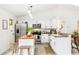 Well-lit kitchen with stainless appliances, wooden island, and granite countertops at 4253 Prairie View Dr, Sarasota, FL 34232