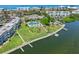 Overhead view of waterfront community with marina, swimming pool, and tennis courts at 4310 Falmouth Dr # 307, Longboat Key, FL 34228
