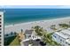 Stunning aerial view of a beach community, offering residents pristine sands and clear waters at 4310 Falmouth Dr # 307, Longboat Key, FL 34228