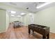 Spacious game room with ping pong and foosball table for recreation at 4310 Falmouth Dr # 307, Longboat Key, FL 34228