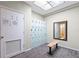 Well-maintained locker room with lockers, bench, and a mirror at 4310 Falmouth Dr # 307, Longboat Key, FL 34228
