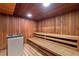 Home sauna complete with wooden benches at 4310 Falmouth Dr # 307, Longboat Key, FL 34228