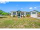 Well-maintained single-Gathering home with inviting curb appeal, featuring lush landscaping and a bright exterior at 440 42Nd N St, St Petersburg, FL 33713