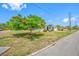 Charming single-Gathering home with a beautiful tree in the front yard, offering shade and curb appeal at 440 42Nd N St, St Petersburg, FL 33713