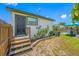 Charming curb appeal with a well-manicured lawn and a welcoming front porch at 440 42Nd N St, St Petersburg, FL 33713