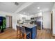 Modern kitchen with island, stainless steel appliances, and white cabinets at 440 42Nd N St, St Petersburg, FL 33713