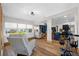 Open-concept living area with lots of light, bonus room, and modern furnishings at 440 42Nd N St, St Petersburg, FL 33713