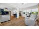 Open-concept living area with lots of light, bonus room, and modern furnishings at 440 42Nd N St, St Petersburg, FL 33713
