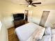Bright main bedroom with a large bed, TV, and closet access at 440 42Nd N St, St Petersburg, FL 33713