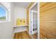 Cozy office space with wood walls, hardwood flooring, and natural light at 440 42Nd N St, St Petersburg, FL 33713
