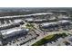 Aerial view of the community with shopping and commercial areas at 4696 Del Sol Blvd, Sarasota, FL 34243
