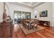 Elegant dining room with hardwood floors and access to the patio at 4696 Del Sol Blvd, Sarasota, FL 34243