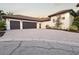 Beautiful home with a two-car garage and a paved driveway at 4696 Del Sol Blvd, Sarasota, FL 34243