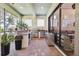 Well-equipped outdoor kitchen and covered patio with stainless steel appliances and ample counter space at 4696 Del Sol Blvd, Sarasota, FL 34243