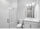 Modern bathroom with a glass-enclosed shower and vanity at 4988 Fairhope Cir, Lakewood Ranch, FL 34211